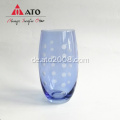 Blaues klares Glas mit Sprühfarbe und Ätzenglas